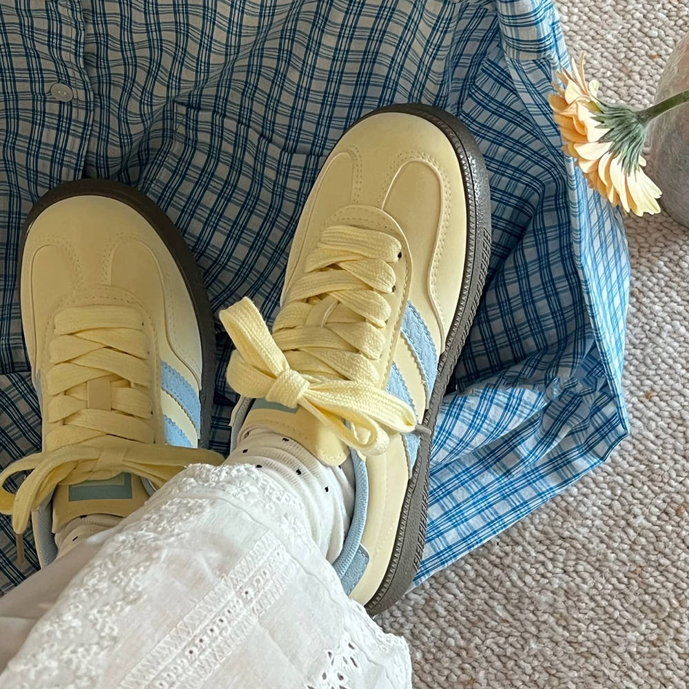 PASTEL YELLOW SNEAKERS WITH LIGHT BLUE ACCENTS