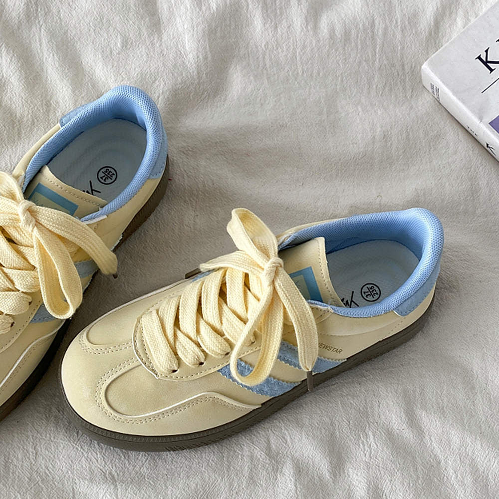 PASTEL YELLOW SNEAKERS WITH LIGHT BLUE ACCENTS