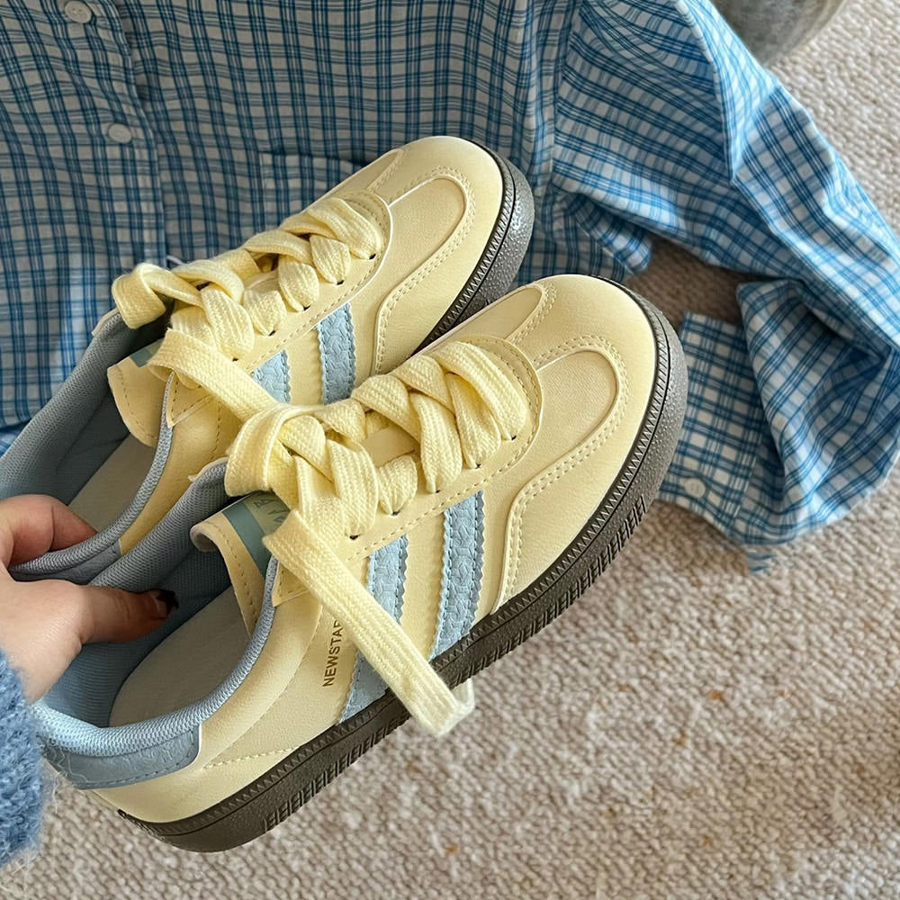PASTEL YELLOW SNEAKERS WITH LIGHT BLUE ACCENTS