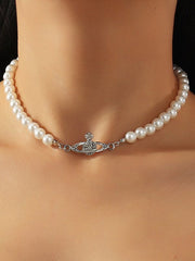 PEARL NECKLACE WITH SATURN PENDANT - ELEGANT JEWELRY ACCESSORY