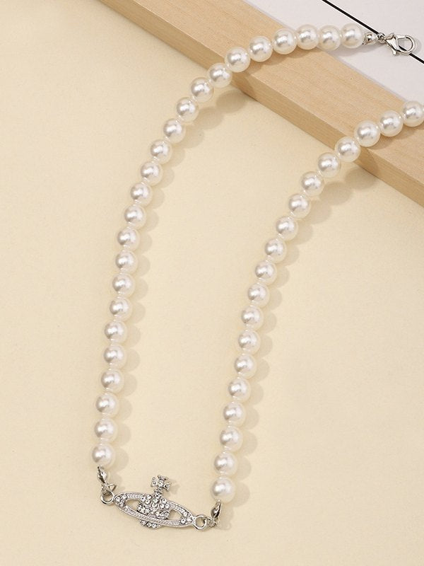 PEARL NECKLACE WITH SATURN PENDANT - ELEGANT JEWELRY ACCESSORY