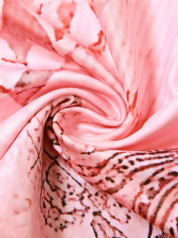 PINK FLORAL SLIP DRESS WITH UNIQUE WRAP STYLE AND HALTER BACKLESS DESIGN