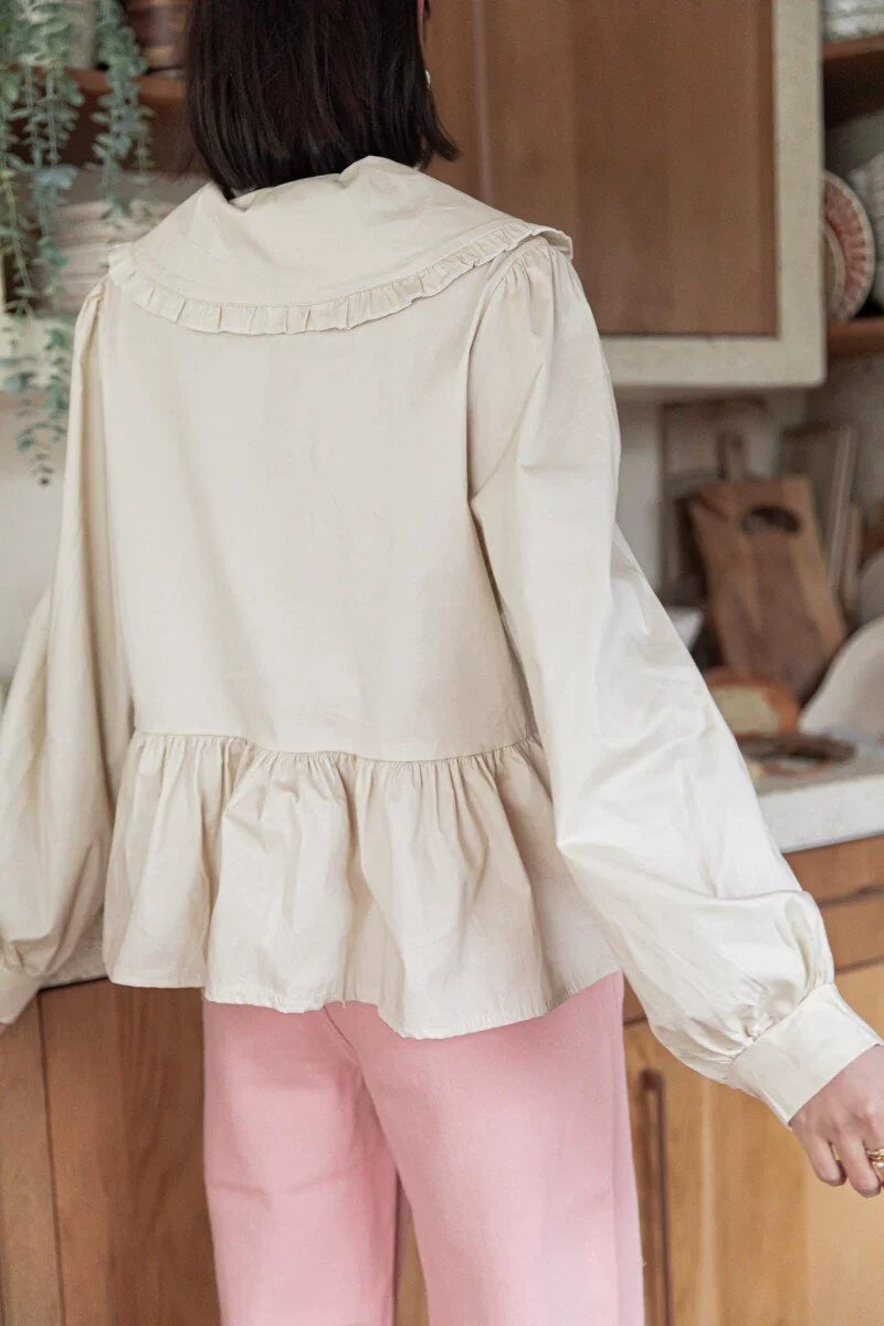 RUFFLED-COLLAR BLOUSE WITH LONG SLEEVES AND SOPHISTICATED LAPEL COLLAR