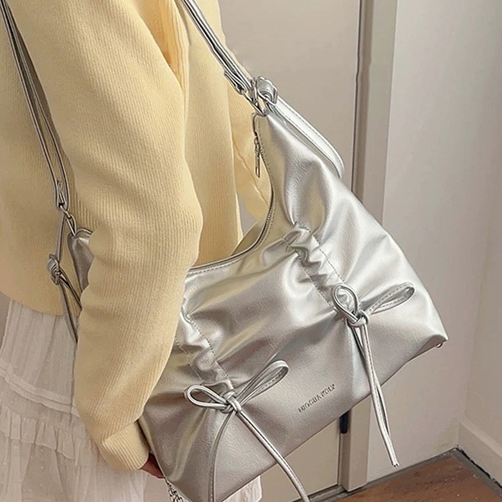 SILVER BOW SHOULDER BAG WITH DELICATE BOW ACCENTS