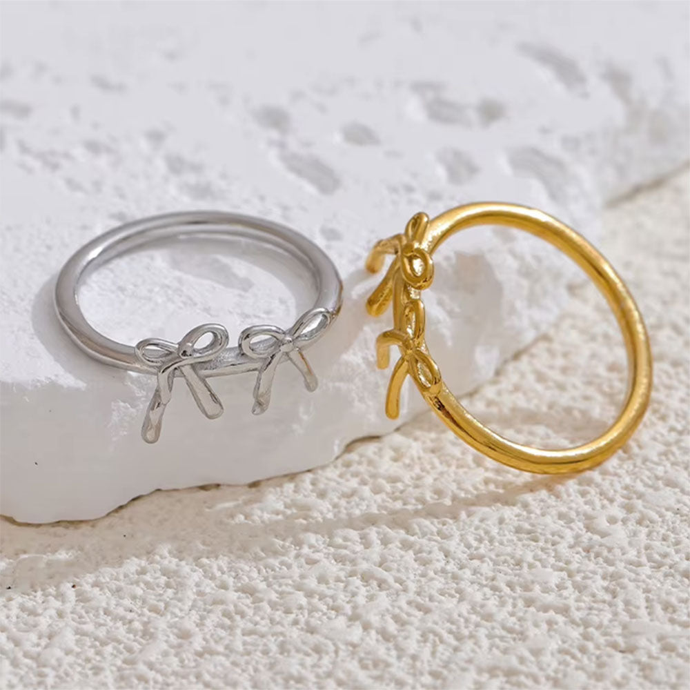 SILVER DOUBLE BOW RING PLAYFUL ELEGANCE JEWELRY COLLECTION