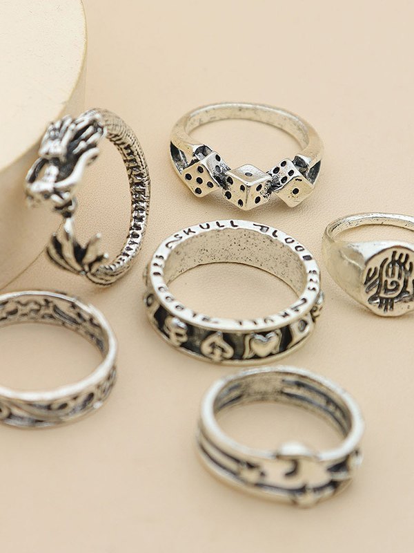 SILVER RING SET HAND ADORNED WITH MULTIPLE RINGS FOR ELEGANCE