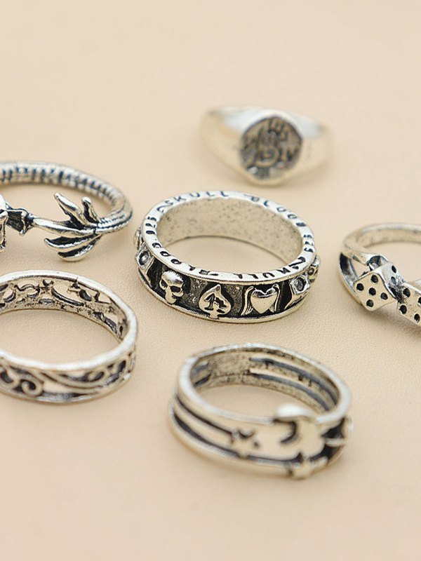 SILVER RING SET HAND ADORNED WITH MULTIPLE RINGS FOR ELEGANCE