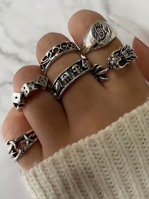 SILVER RING SET HAND ADORNED WITH MULTIPLE RINGS FOR ELEGANCE