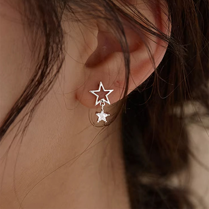 SILVER STAR ASYMMETRIC EARRINGS CELESTIAL STAR ASYMMETRIC