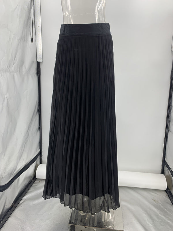Black pleated maxi skirt from the Sleeveless Chanel style vest mesh two-piece set