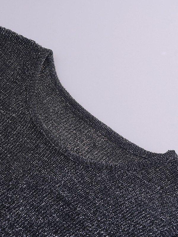 SLEEVELESS METALLIC TOP IN TIMELESS BLACK WITH DELICATE METALLIC ACCENTS