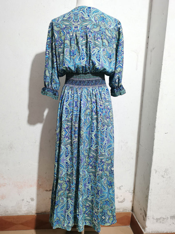 Blue paisley maxi dress with three-quarter sleeves and bohemian casual holiday style