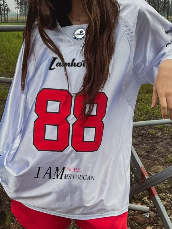 TWO SHORT SLEEVE JERSEYS WITH CONTRAST COLORS AND RETRO PRINT