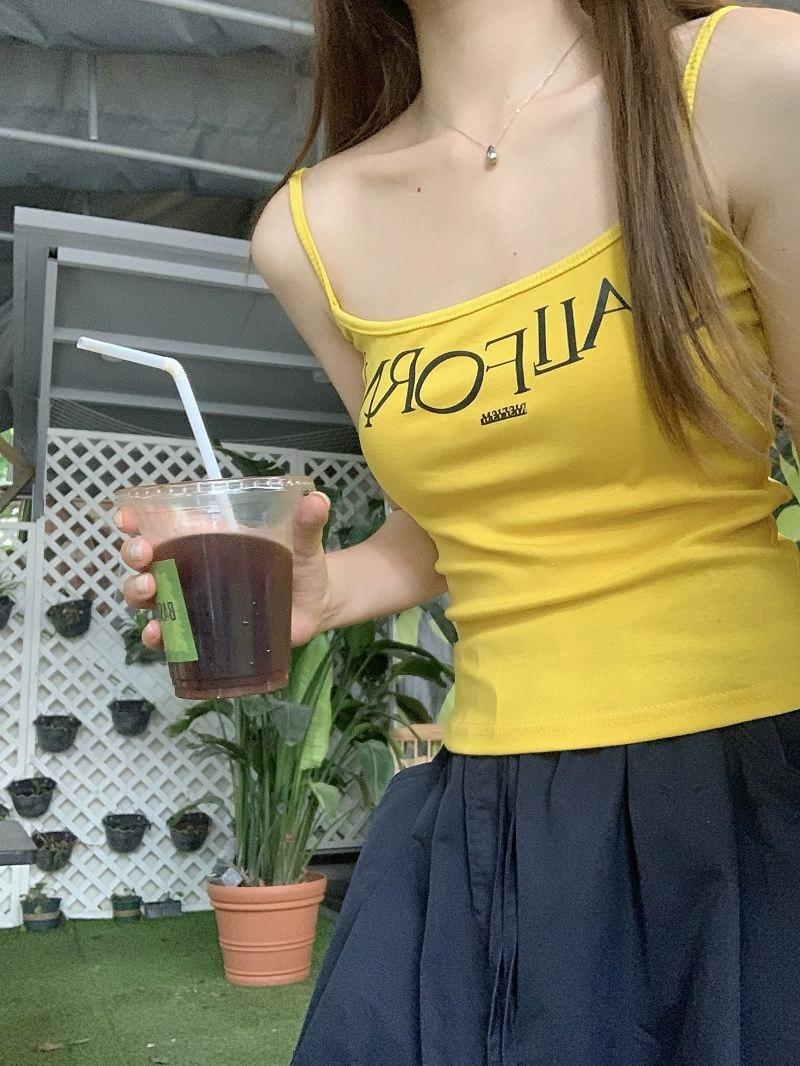 VIBRANT YELLOW CAMI AND BLACK CARGO PANTS SET WITH BOLD LETTER PRINT