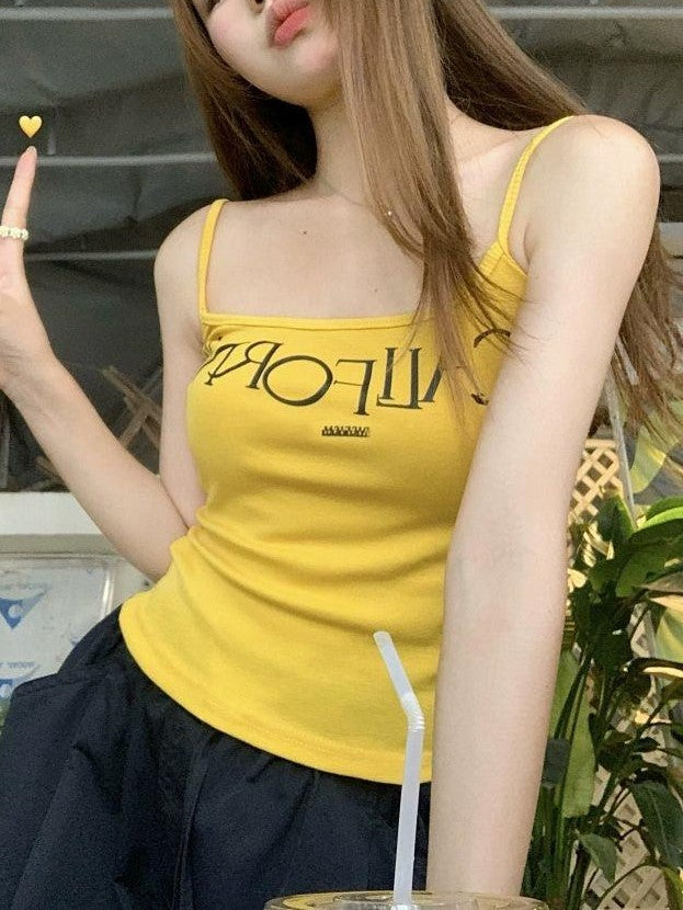 VIBRANT YELLOW CAMI AND BLACK CARGO PANTS SET WITH BOLD LETTER PRINT