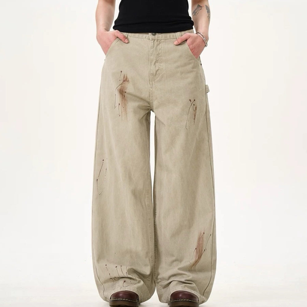 VINTAGE-INSPIRED WIDE-LEG FADED JEANS WITH ARTISTIC BACK POCKET