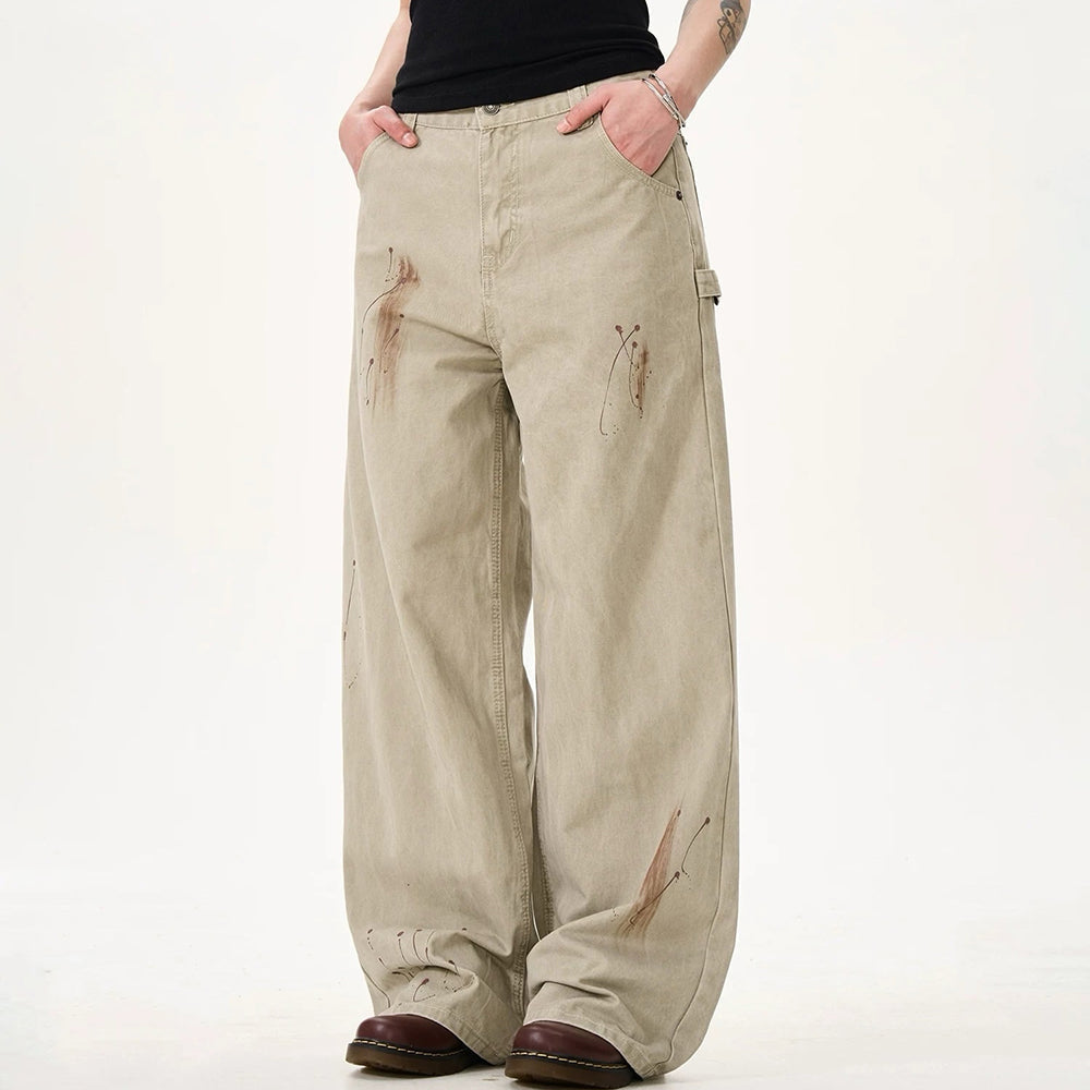 VINTAGE-INSPIRED WIDE-LEG FADED JEANS WITH ARTISTIC BACK POCKET