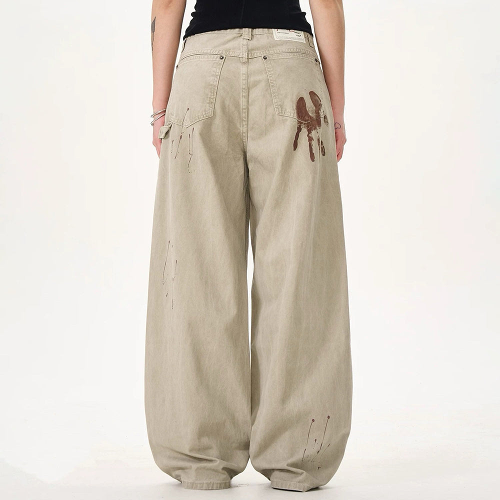 VINTAGE-INSPIRED WIDE-LEG FADED JEANS WITH ARTISTIC BACK POCKET