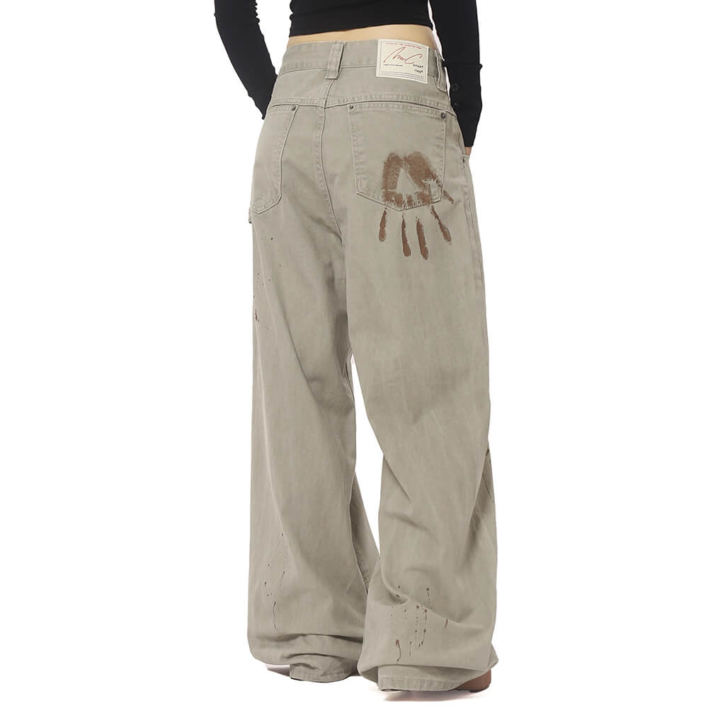 VINTAGE-INSPIRED WIDE-LEG FADED JEANS WITH ARTISTIC BACK POCKET