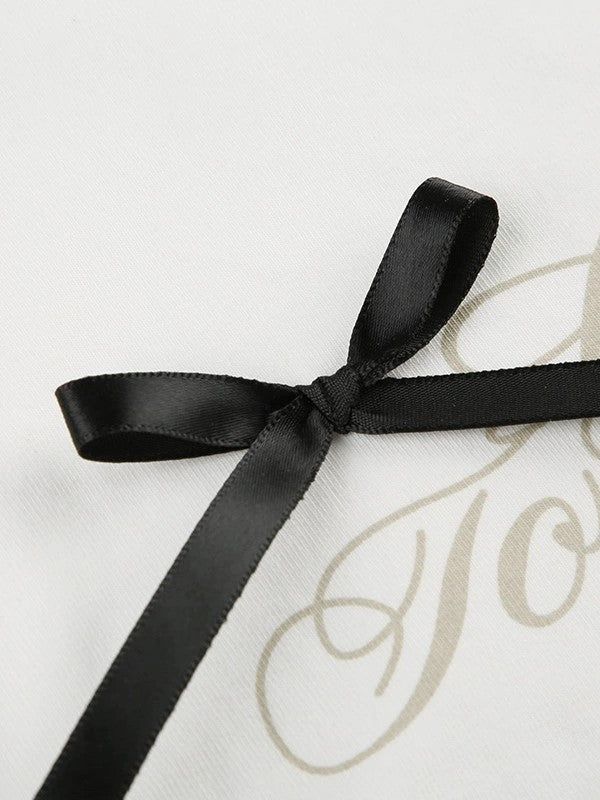 WHITE CROP TOP WITH RIBBON BOWS - BOLD LETTER PRINTS Y2K STYLE