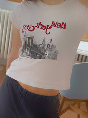 WHITE Y2K SHORT SLEEVE T-SHIRT WITH NYC SKYLINE DESIGN