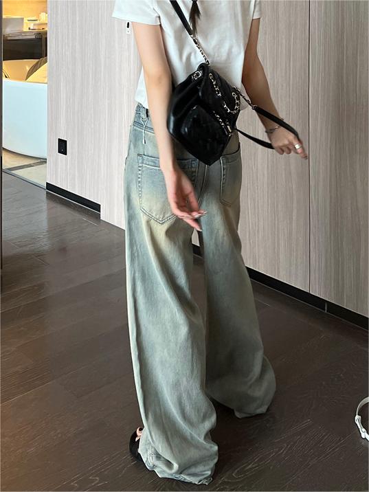 WIDE-LEG ACID-WASH JEANS IN WASHED TENCEL DENIM
