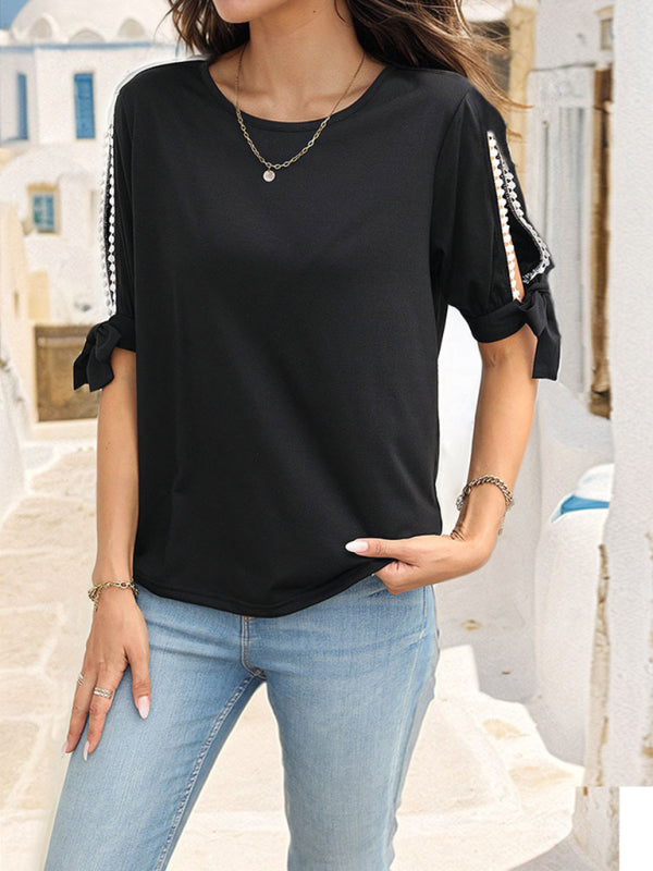 Women’s black top with hollow shoulders