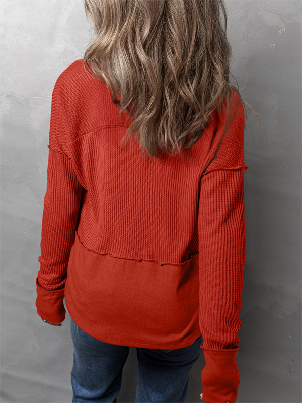 Red waffle-knit long-sleeve shirt in solid color, casual women’s clothing item