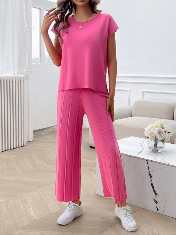 Woman wearing pink knit pantsuit from Women’s Casual Solid Color Sweater Set collection