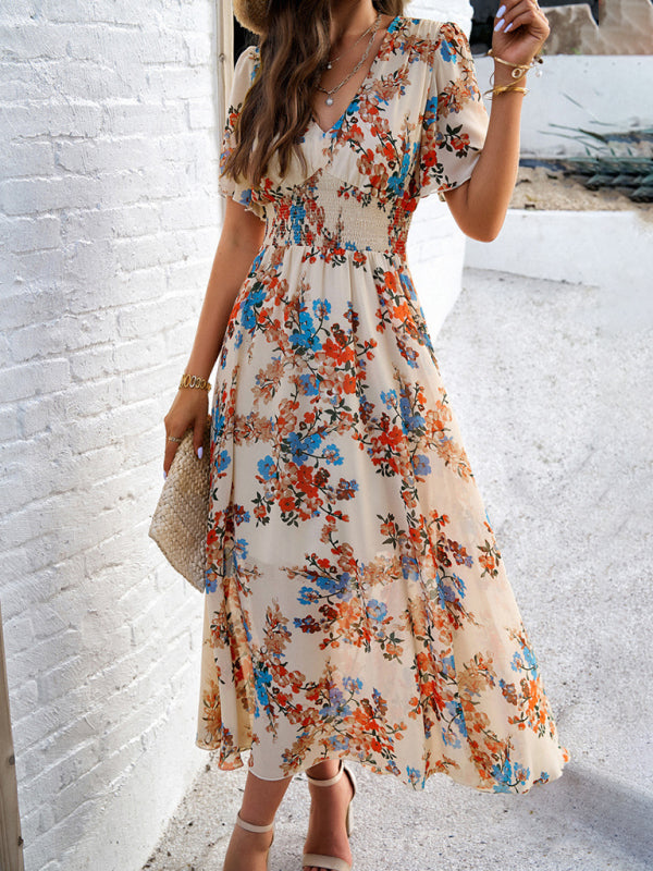 Elegant printed floral midi dress with slight elasticity and random print design