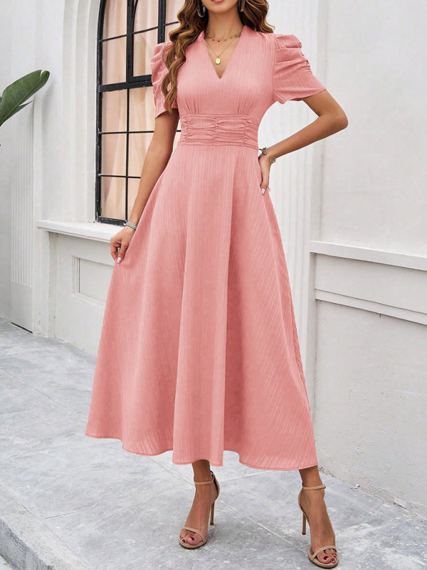 Elegant solid color pink midi dress for women showcasing stylish waist design