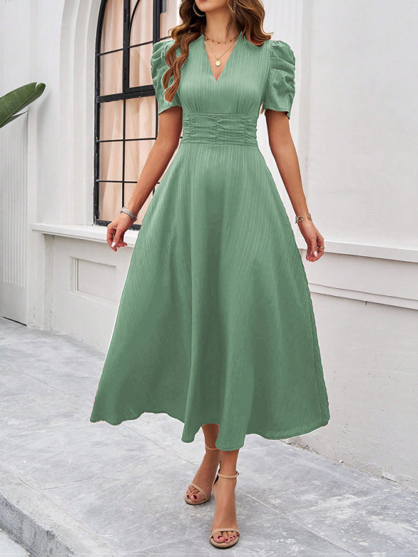 Elegant women’s green solid color v-neck midi dress for formal occasions