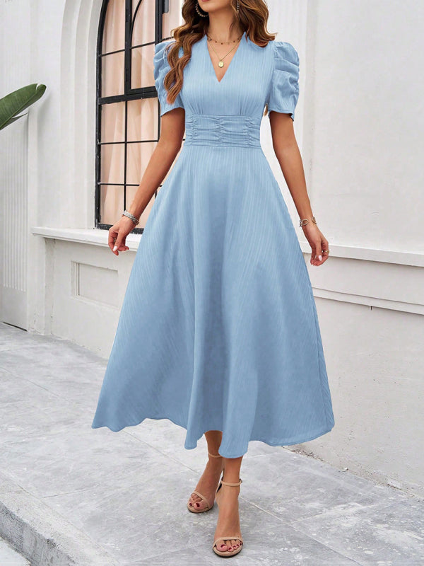 Light blue midi dress showcasing a women’s elegant solid color waist dress for stylish occasions