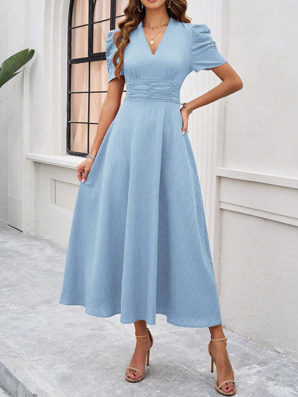 Elegant light blue solid color midi dress for women featuring a waist design