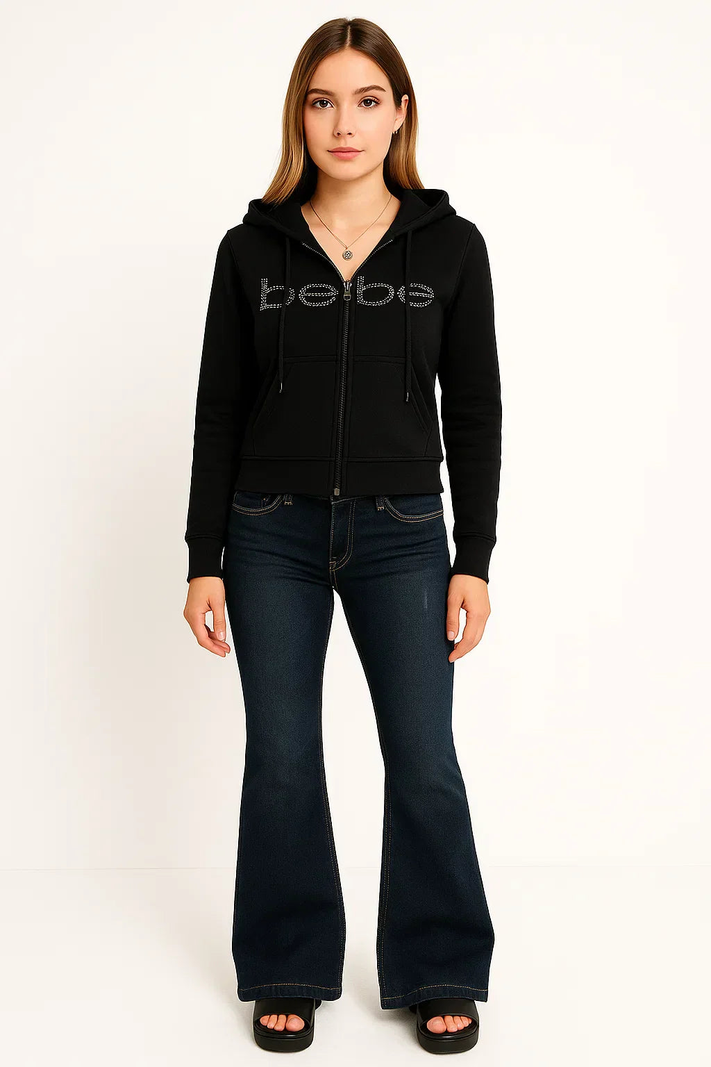 WOMEN’S PINK HOODIE AND FLARED JEANS OUTFIT