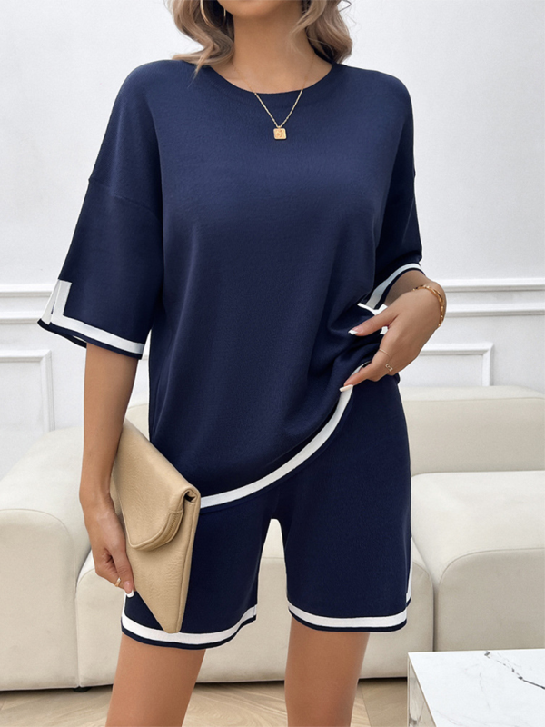 Navy blue shorts and top set with white trim from Women’s round neck casual sweater two-piece set, includes size chart