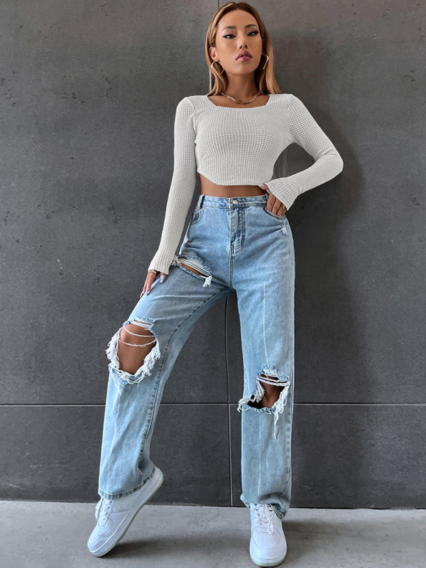 Woman in ripped jeans wearing a Walv Fang square collar long-sleeved T-shirt