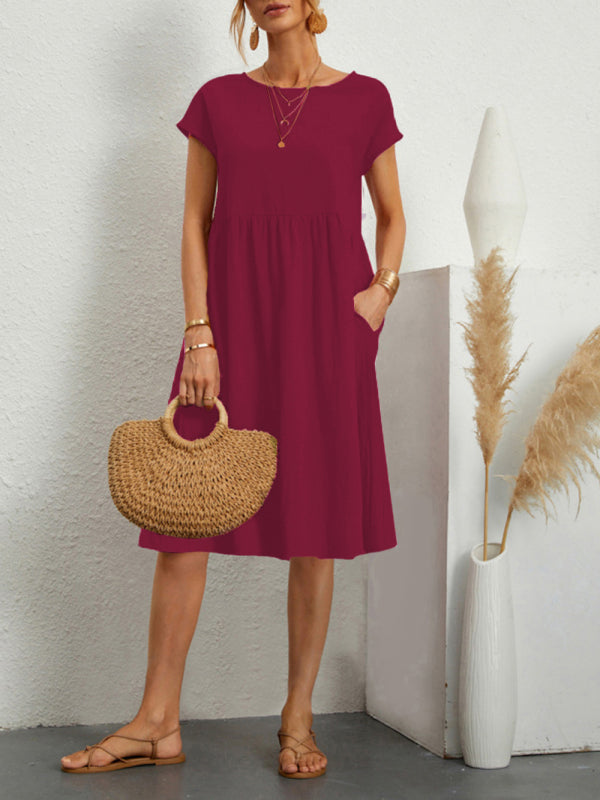 Burgundy midi dress with pockets featuring round neck and solid color cotton sleeves