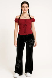 Y2K STARLIGHT OUTFIT - WOMAN IN RED OFF-THE-SHOULDER TOP AND VELOUR PANTS