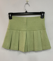 Green houndstooth pleated mini skirt – front view