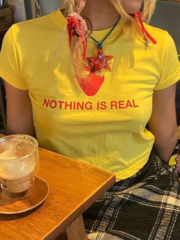 YELLOW SLIM FIT T-SHIRT WITH NOTHING IS REAL TEXT Y2K STYLE