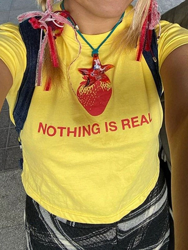 YELLOW SLIM FIT T-SHIRT WITH NOTHING IS REAL TEXT Y2K STYLE