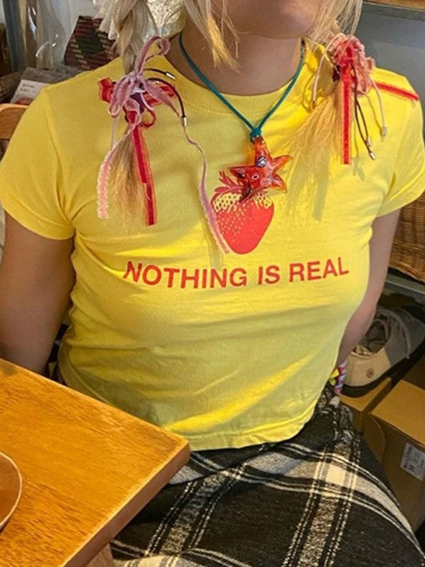 YELLOW SLIM FIT T-SHIRT WITH NOTHING IS REAL TEXT Y2K STYLE