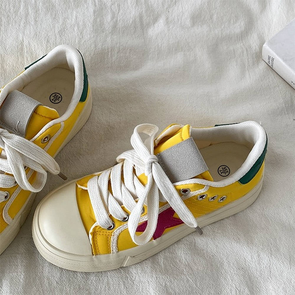 YELLOW STAR SNEAKERS WITH RED STAR PATCH